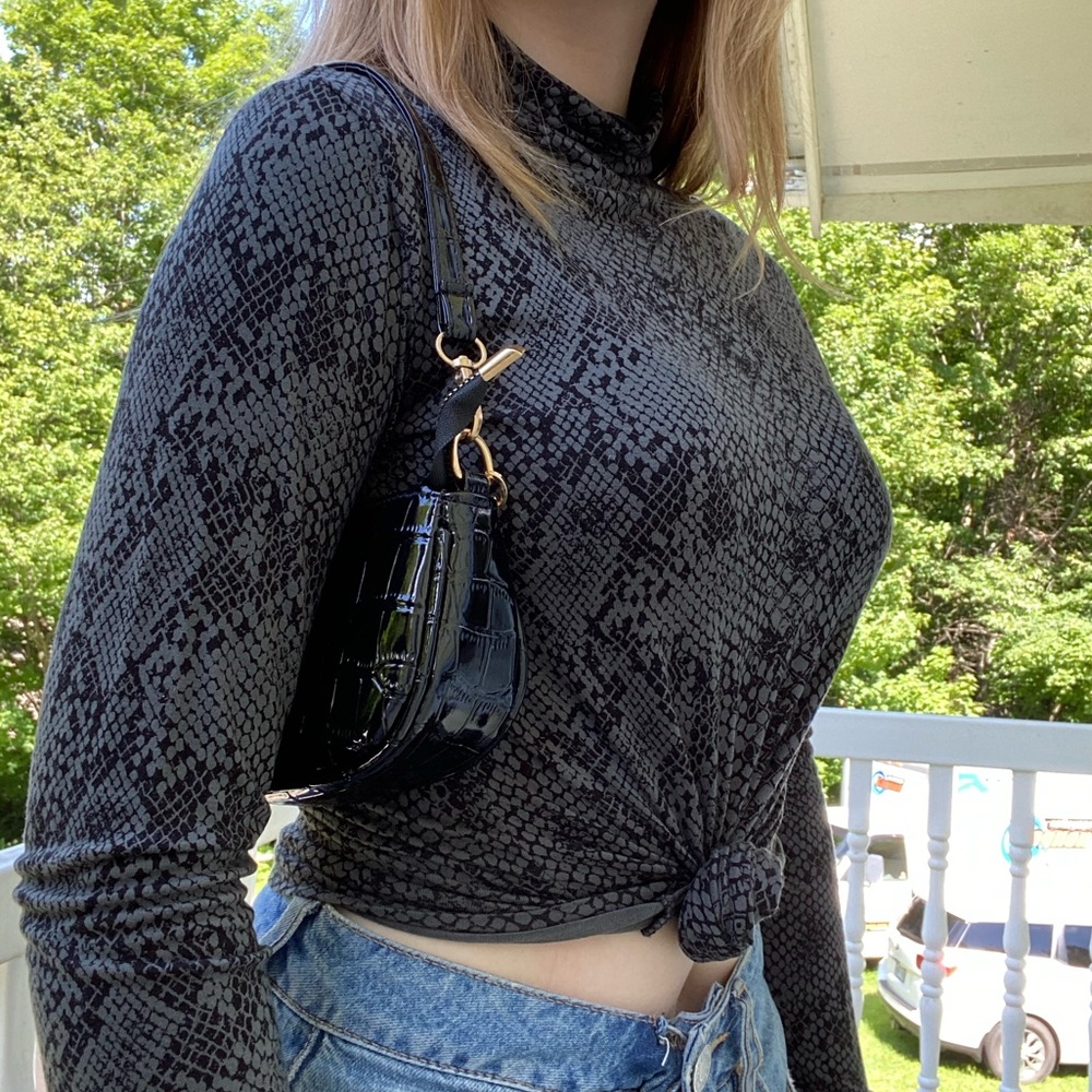 Snake print turtle neck